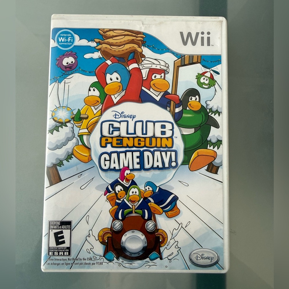 Disney Club Penguin Game Day! for Wii with original case and instruction booklet